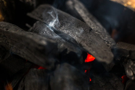 Fire and charcoal grill,with smoke background