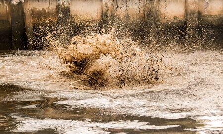 Waste water splashing. Critical of environmentの写真素材