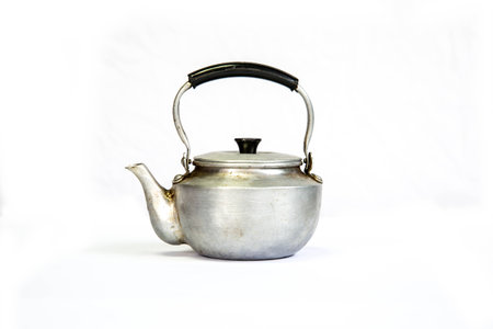 Small old kettle to boil water.の写真素材