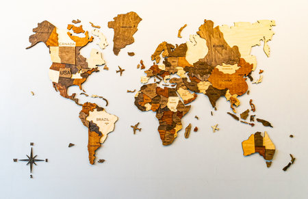 World map made of wooden pieces. Conceptual image of the world.の写真素材