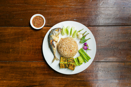 Thai food dish called Rice Mixed with Shrimp pasta  Served with mackerel and soupの写真素材