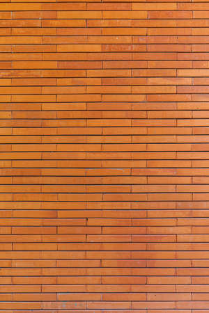 Red brick wall. Texture of old dark brown and red brick wall background.