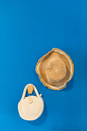 bag and hat hanging on the wallの写真素材