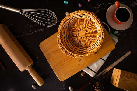 bread cutting board with bakery ingredients for homemade baking on table. Food recipe concept top...