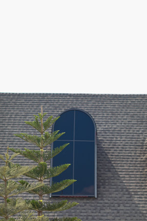 The top of the house or building with nice window on the roof.の写真素材