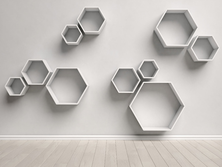 Empty white interior with hexagon shelves on the wallの写真素材
