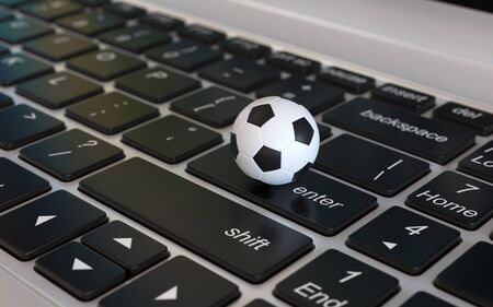 Football ball, soccer ball, on laptop keyboard, 3d rendering