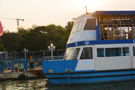 Thai people and foreign travelers travel visit and take photo with ferry boat at Chao Phraya river...