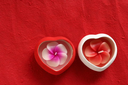 Candle and Heart  for love festival red background.の写真素材