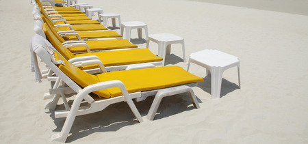 Bed yellow on the beach for relax.