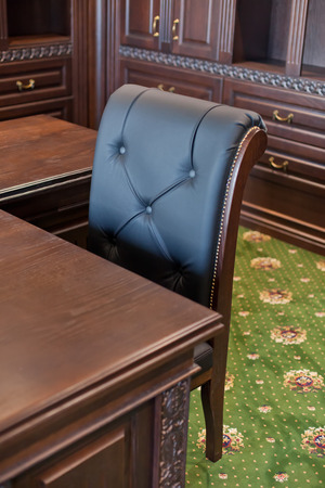 Old Classic chair in chief cabinet.Backgroundの写真素材