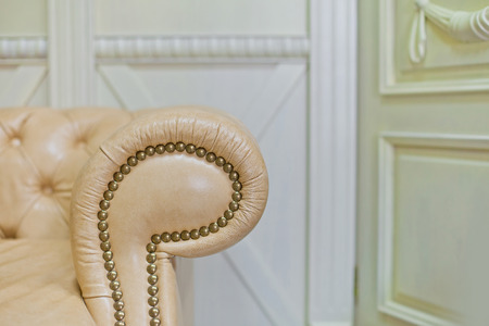 Gold classic sofa in interior. Details backgroundの写真素材