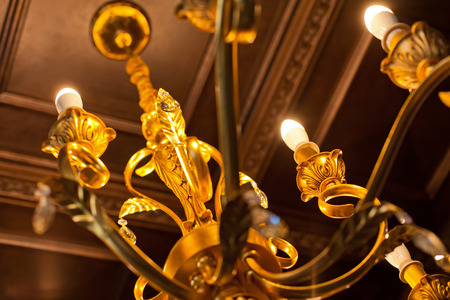 Element of beautiful crystal chandelier in a room. Close-upの写真素材