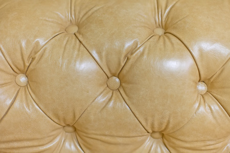 Texture of vintage buttoned leather stylish upholsteryの写真素材