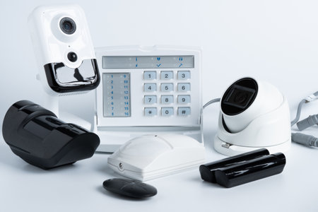 Various security system equipment on white background