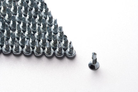 neatly arranged screws in a row self-tapping screwsの写真素材