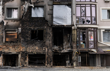 Windows of an apartment building after a fireの写真素材