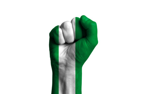 Man hand fist of NIGERIA flag painted. Close-upの写真素材