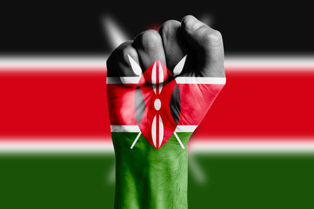 Man hand fist of KENYA flag painted. Close-upの写真素材