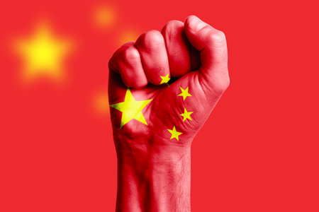 Man hand fist of CHINA flag painted. Close-upの写真素材
