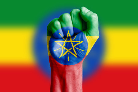 Man hand fist of ETHIOPIA flag painted. Close-upの写真素材