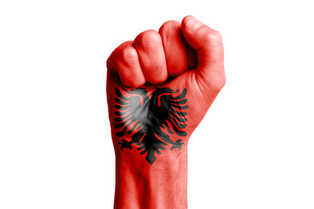 Man hand fist of ALBANIA flag painted. Close-upの写真素材