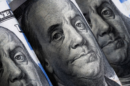 Closeup portrait of Benjamin Franklin on 100 us dollar billの写真素材