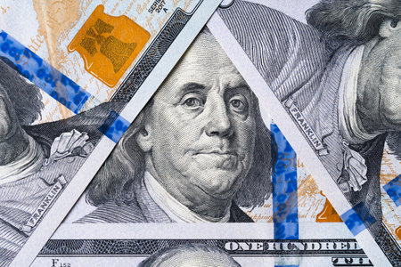 One Hundred Dollars and portrait Benjamin Franklin on USA money banknote