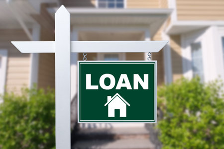 LOAN sign against a house. close-upの写真素材