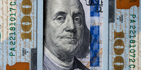 Closeup portrait of Benjamin Franklin on 100 us dollar bill