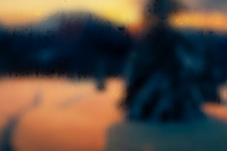 Condensation on the clear glass window. Cold winter outside blured.の写真素材