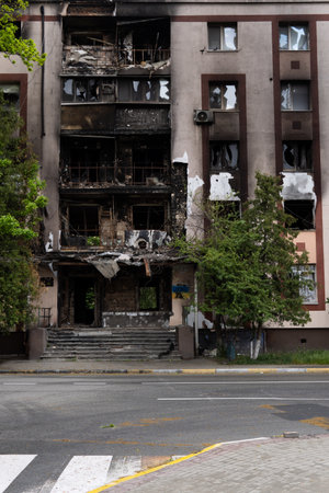 War in Ukraine. Destroyed buildings in the Kyiv region after the attack of the Russian army. Consequences of the Russian invasion of Ukraine. Kyiv region, Ukraine, June 2022のeditorial素材