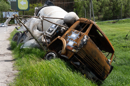 Irpin, Kyiv region, Ukraine - war in Ukraine. Car graveyard. Cars of civilians were shot. Russias war against Ukraine. Exploded car. Cars damaged after shelling. irpin bucha. war crimesのeditorial素材