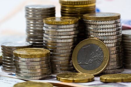 One euro cent coin on the background of coinsの写真素材