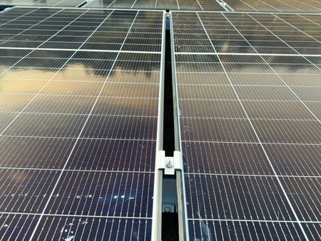View of residential solar panels in action, converting sun rays into usable green energy.