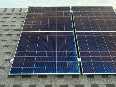 Clean, renewable solar energy system installed on a residential homes rooftop to reduce utility...
