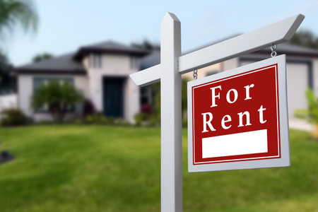 Home for rent. Sign in front of new homeの写真素材