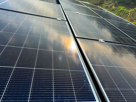 House roof covered with photovoltaic panels, emphasizing renewable energy and sustainability.