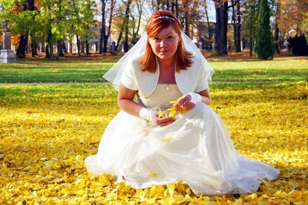 Bride in autumn parkの写真素材