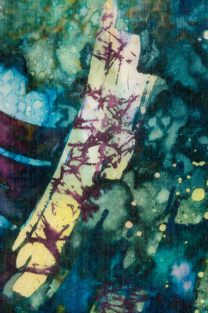Colorful abstraction fragment, hot batik handmade abstract surrealism art on silk, background textureの写真素材