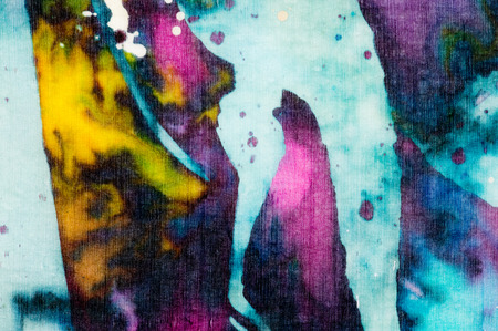 Colorful abstraction fragment, hot batik handmade abstract surrealism art on silk, background textureの写真素材