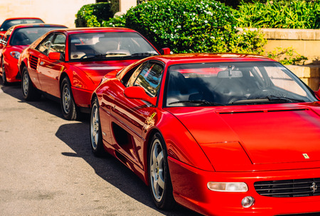 Ferrari show 8 october 2016 in Valletta, Malta. Front view of red Ferraries near Grand Hotel...