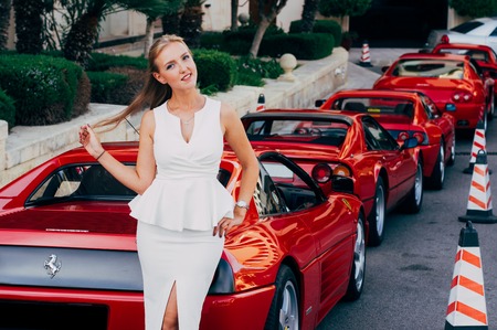Ferrari show 8 october 2016 in Valletta, Malta, near Grand Hotel Excelsior. Beautiful young girl near the red Ferrari 348 TSのeditorial素材