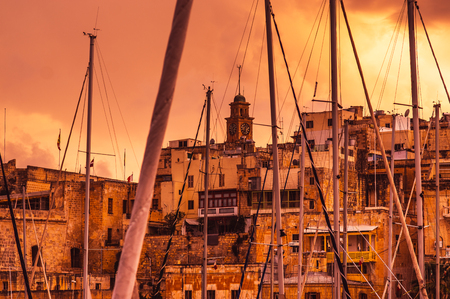 Pink evening in Senglea and Clock tower of the Maritime Museum, Maltaの写真素材