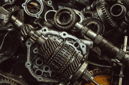 A lot of broken gears and shafts in the garbage boxの写真素材