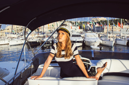 Young girl have fun and posing on yacht, Maltaの写真素材