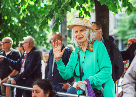 Helsinki, Finland - June 30, 2018: Aged woman on street on Helsinki pride festivalのeditorial素材