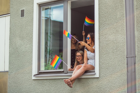Helsinki, Finland - June 30, 2018: Girls in window on Helsinki pride festivalのeditorial素材
