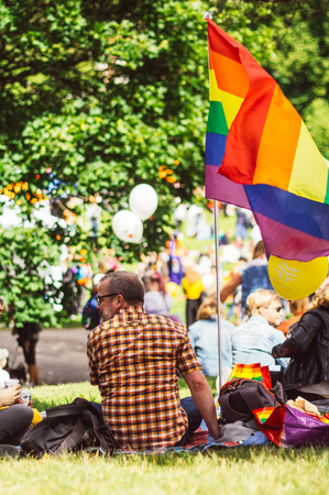 Helsinki, Finland - June 30, 2018: Participants in Kaivopuisto garden on Helsinki pride festivalのeditorial素材