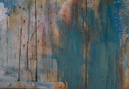Old door with different paint, use as natural backgroundの写真素材